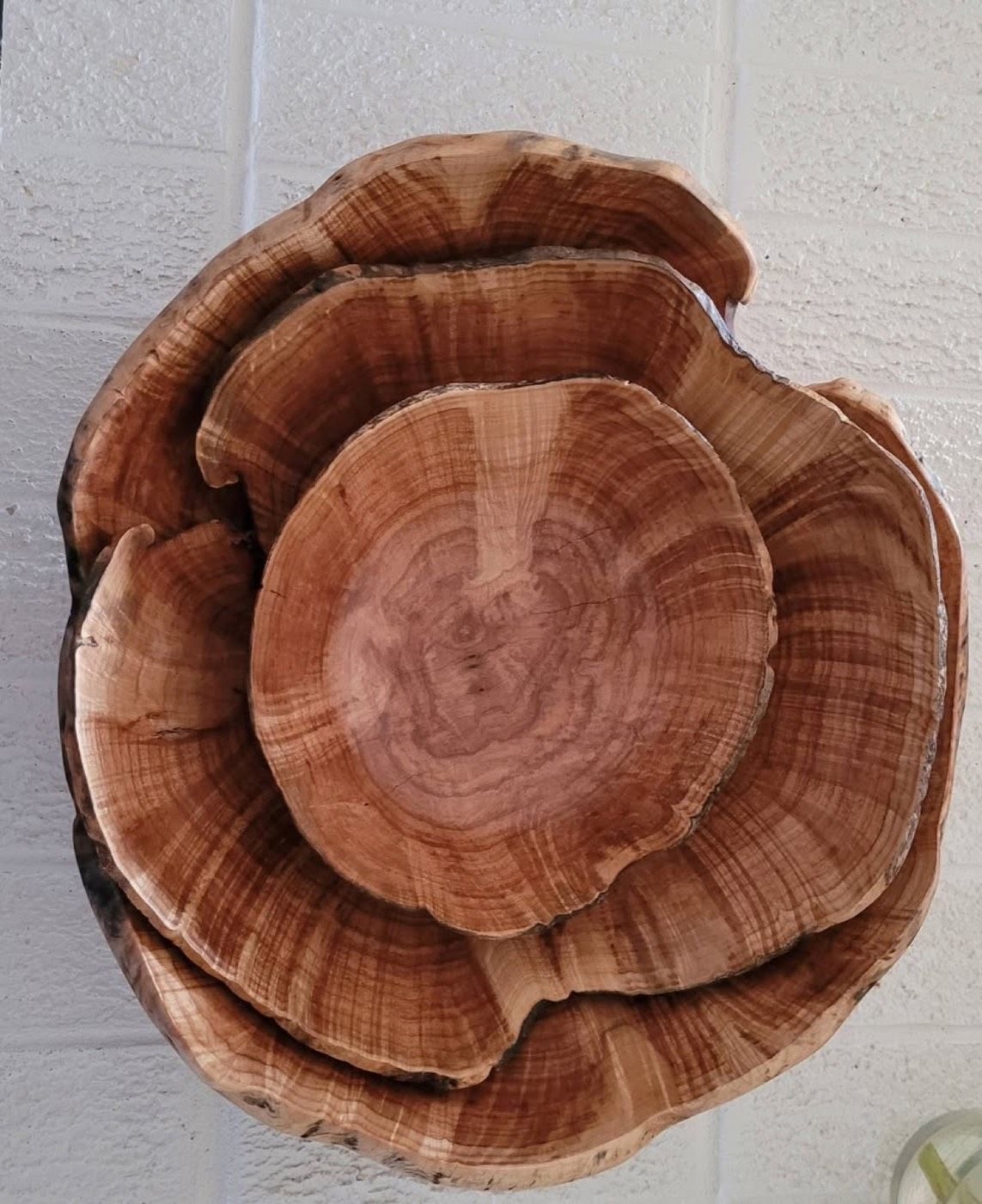 A natural-edge bowl with rich reddish grain